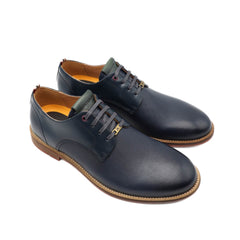 Stringata Ambitious blu in pelle vista laterale.