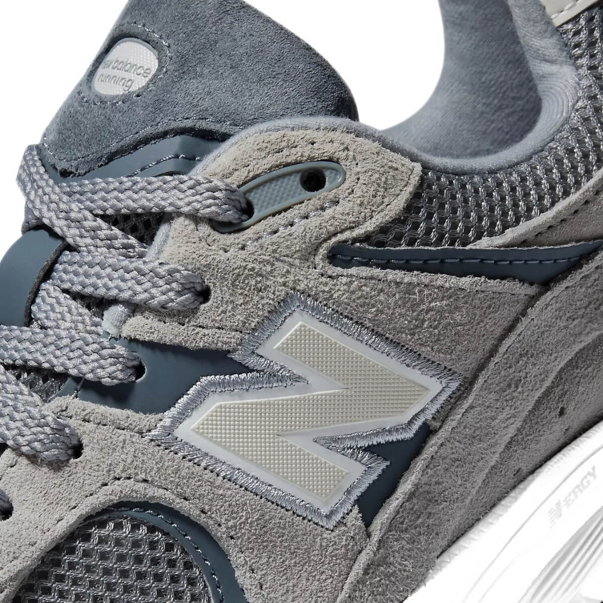 New Balance 2002R M200RST grigie vista laterale