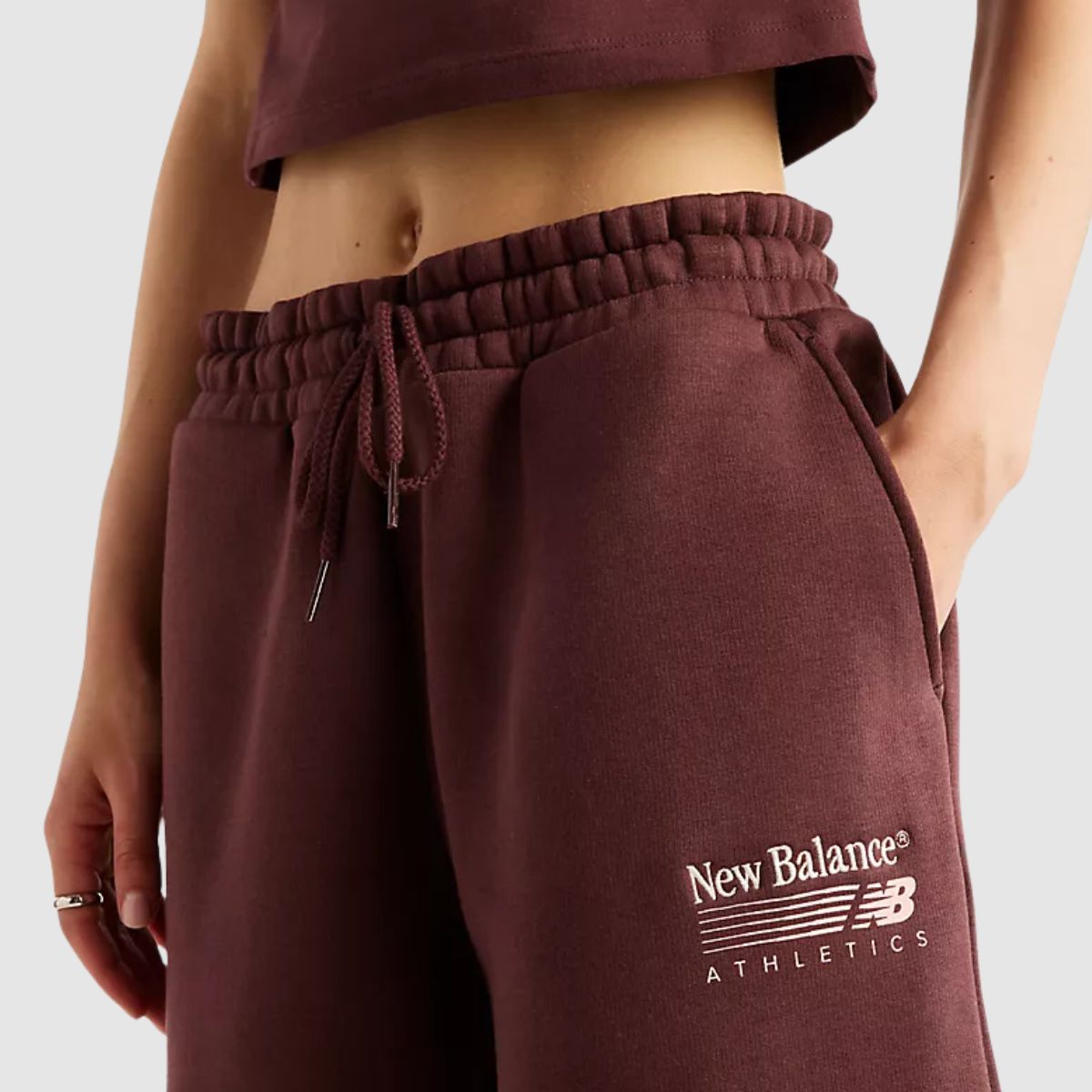 NEW BALANCE PANTALONE WB62983A BORDEAUX